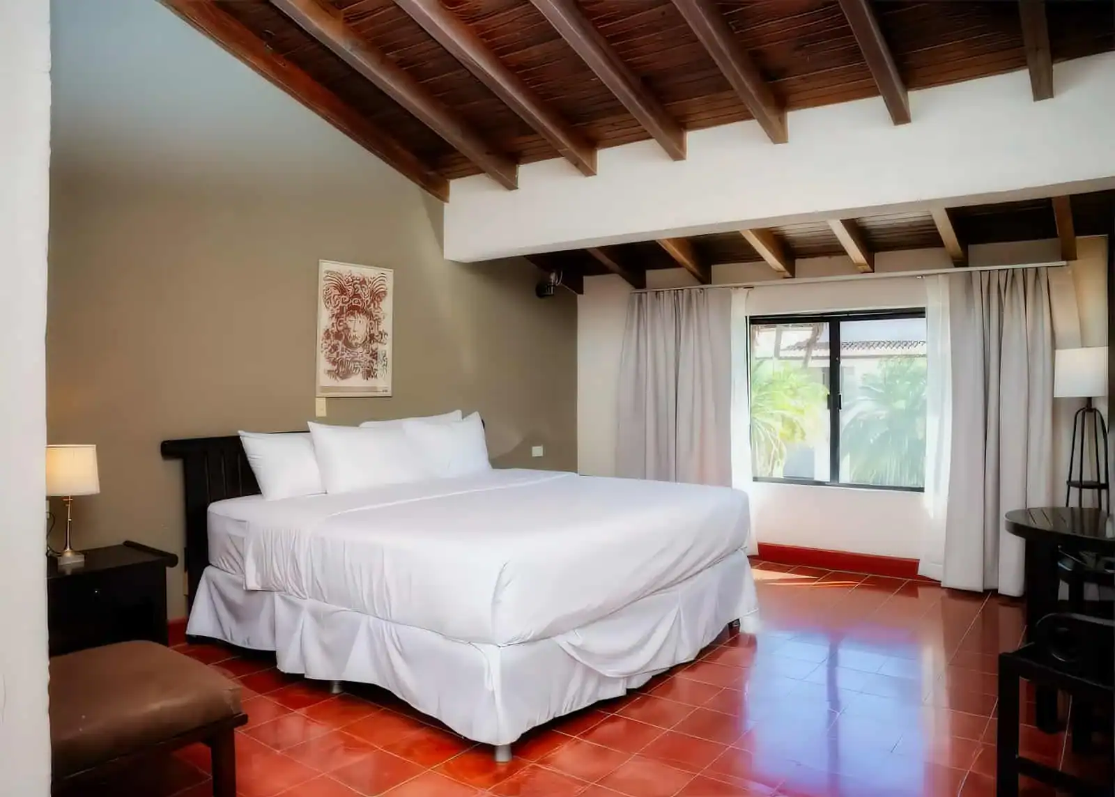 Ancestral Copan Hotel's Premium King Room featuring one king bed
